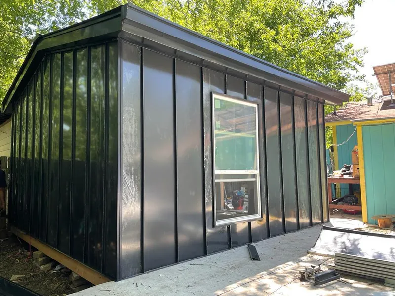 Black standing seam metal wall panels for Metal Roof Installation in Fort Valley